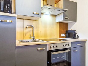 Fridge, microwave, cookware/dishes/utensils
