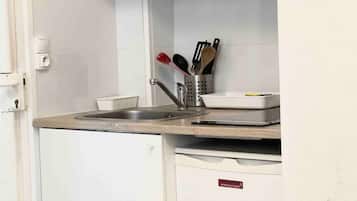 Fridge, coffee/tea maker, cookware/dishes/utensils