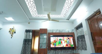 A Beautiful Homestay having 3 bedrooms, 2 Halls, kitchen and dinning table