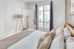 1 habitación, tabla de planchar con plancha, wifi y ropa de cama 