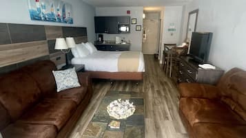 Tabla de planchar con plancha, wifi y ropa de cama