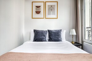 1 غرفة نوم ومكواة/لوح كي وواي فاي وملاءات أسرّة