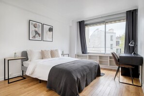 2 chambres, fer et planche à repasser, Wi-Fi, draps fournis