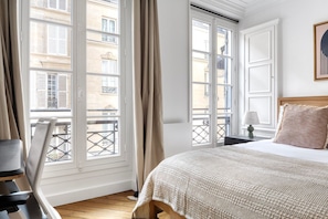 2 habitaciones, tabla de planchar con plancha, wifi y ropa de cama 