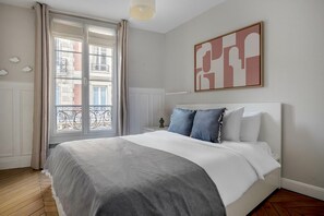 2 chambres, fer et planche à repasser, Wi-Fi, draps fournis