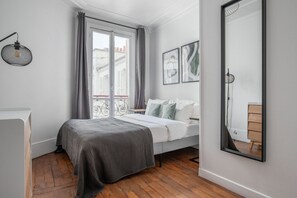2 chambres, fer et planche à repasser, Wi-Fi, draps fournis