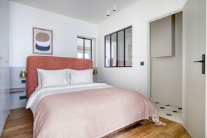 1 slaapkamer, een strijkplank/strijkijzer, wifi, beddengoed