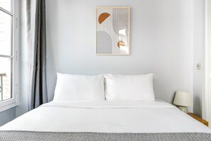 2 habitaciones, tabla de planchar con plancha, wifi y ropa de cama 