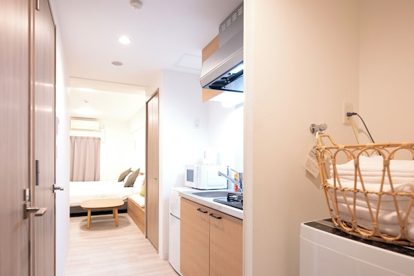 Habitación cuádruple clásica, balcón | Cortinas opacas y sistema de insonorización