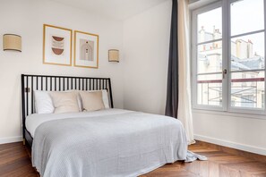 2 chambres, fer et planche à repasser, Wi-Fi, draps fournis