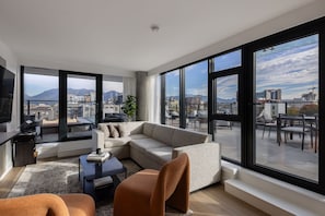 Terrace Apartment | Living area | 50-inch Smart TV with cable channels, streaming services - Keefer House (Vancouver)