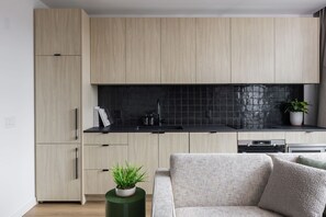 One Bedroom Apartment | Private kitchen | Full-size fridge, microwave, oven, stovetop