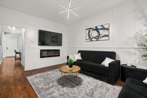 Smart TV, fireplace, books