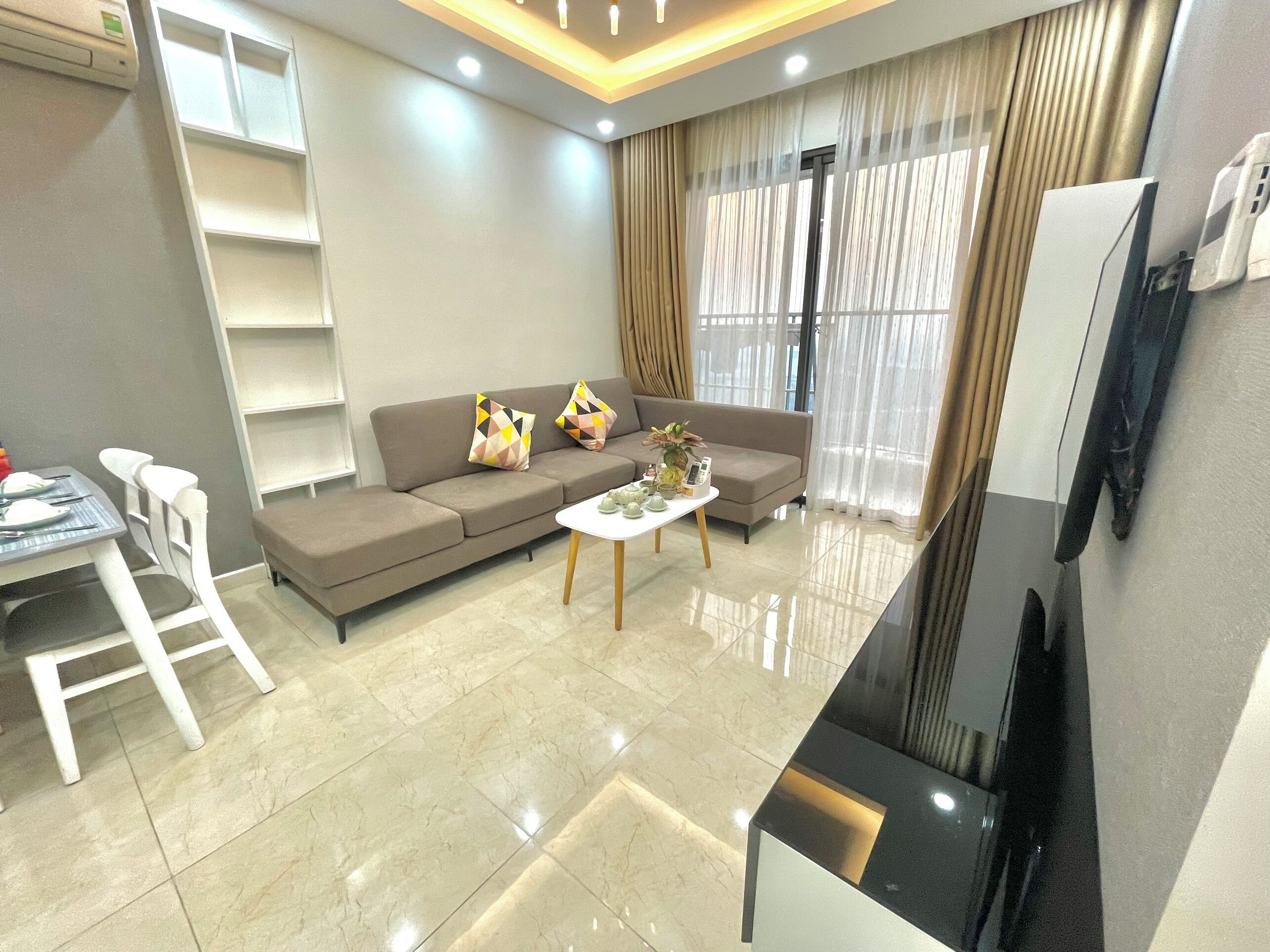 Căn hộ, 2 phòng ngủ, quang cảnh thành phố | Khu phòng khách | TV màn hình phẳng 55-inch có truyền hình cáp, Netflix, dịch vụ stream 