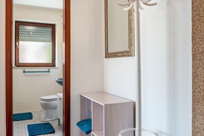 Een douche, handdoeken