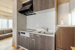Quarto conforto, para não fumantes | Cozinha privada