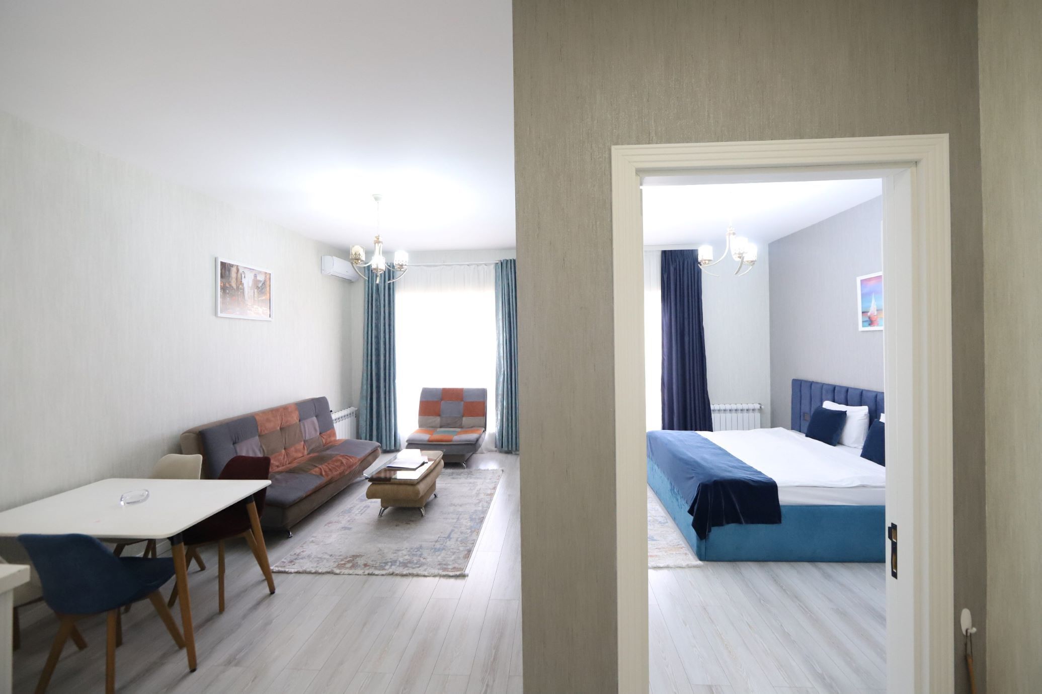 Comfort Apartment, Balcony, City View | Premium bedding, minibar, in-room safe, desk