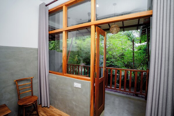 Suite Deluks, balkon, pemandangan kebun | Wi-Fi gratis
