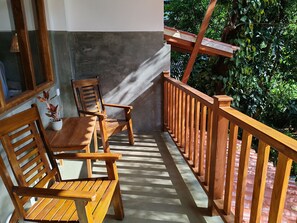 Deluxe Quadruple Room, Balcony, Garden View | Terrace/patio