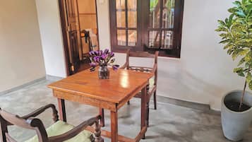 Standard Triple Room, Patio, Garden View | Terrace/patio