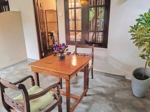 Standard Triple Room, Patio, Garden View | Terrace/patio