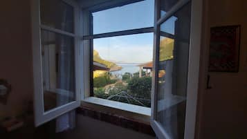 Quarto casal superluxo, banheiro privativo, vista para o mar | Vista para praia/oceano