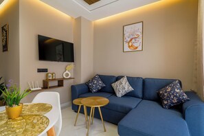 Comfort Apartment, 1 Queen Bed with Sofa bed, Non Smoking, Air conditioning | Living area | 50-inch Smart TV with satellite channels, Netflix, pay movies - Cozy Elegant Apartment - Rabat Center- Free Parking & AirC & Internet (Rabat)