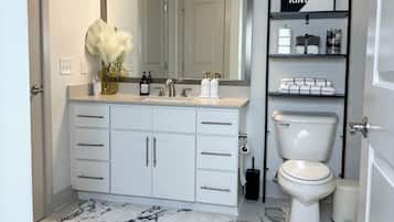 Hair dryer, towels, soap, toilet paper