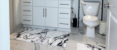 Hair dryer, towels, soap, toilet paper