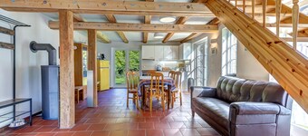 House in the middle of the garden by the swan pond