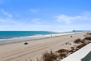 On the beach - Garden City Beach Oceanfront Condo 209BH | Rising Tides Properties Rental (Murrells Inlet)