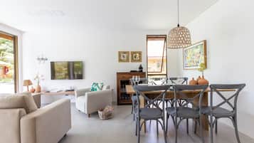 Bungalow Confort, alberca privada | Área de sala de estar