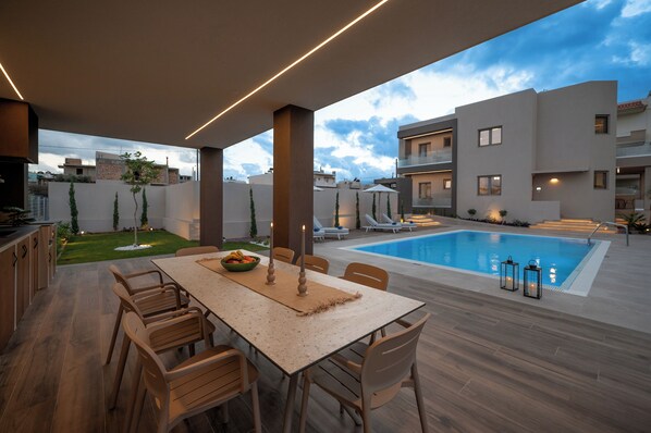 Outdoor dining - Magian Luxury Apartments (Malevizi)