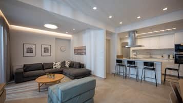 Luxury Apartment, 2 Bedrooms, Garden View | Living area | 32-inch Smart TV with cable channels