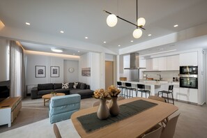 Luxury Apartment, 2 Bedrooms, Garden View | Living area | 32-inch Smart TV with cable channels - Magian Luxury Apartments (Malevizi)