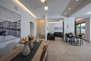Luxury Apartment, 2 Bedrooms, Garden View, Ground Floor | Living area | 32-inch Smart TV with cable channels - Magian Luxury Apartments (Malevizi)