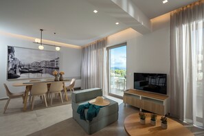 Luxury Apartment, 2 Bedrooms, Garden View | Living area | 32-inch Smart TV with cable channels - Magian Luxury Apartments (Malevizi)