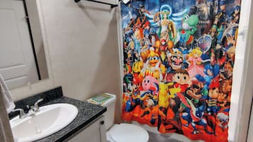 Shower, towels, soap, toilet paper