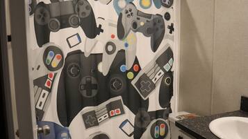 Shower, towels, soap, toilet paper