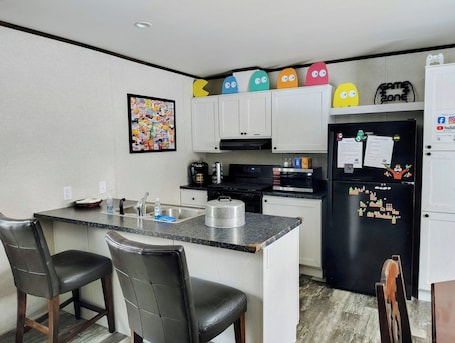 Fridge, microwave, oven, stovetop. GamerBnB, relive all of video game history in the comfort of a bed & breakfast.
