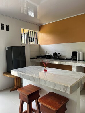 Private kitchen - Corcovado House with AC Surrounded by nature and in the center of town! (Puerto Jiménez)