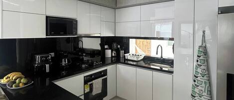 Fridge, microwave, oven, coffee/tea maker