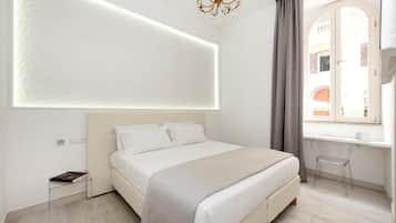 Deluxe-Doppel- oder -Zweibettzimmer | Zimmersafe, schallisolierte Zimmer, Bügeleisen/Bügelbrett