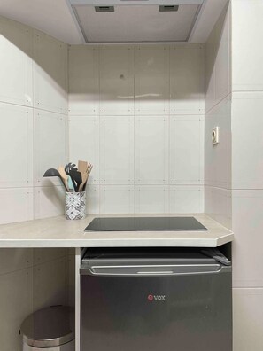 Microwave, stovetop, coffee/tea maker, electric kettle