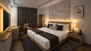 Premium bedding, down duvets, memory-foam beds, in-room safe