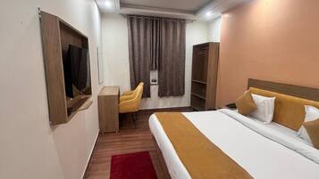 Premium bedding, down duvets, memory-foam beds, in-room safe