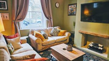 Maison | Coin séjour | Cheminée