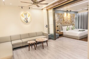 Presidential Suite, 1 King Bed, Accessible Bathtub, Housekeeping | Living area | 50-inch LED TV with cable channels, Netflix, heated floors - Narang Hotel (Hanumangarh)