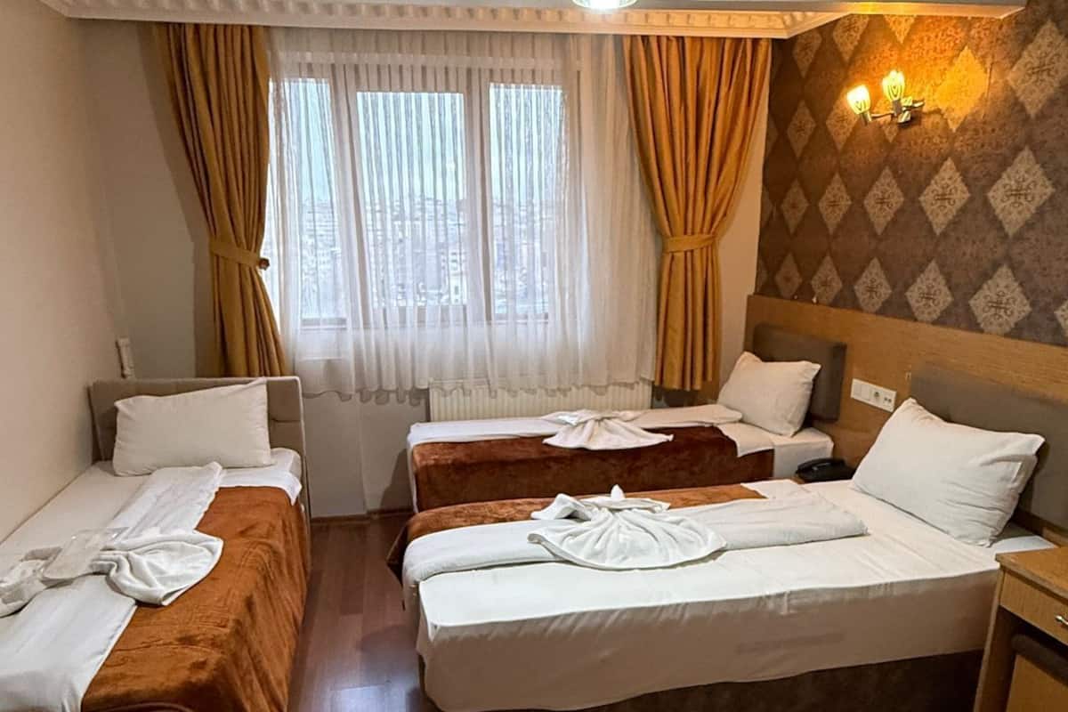 Chambre Triple Standard | Literie de qualité supérieure, minibar, chambres insonorisées