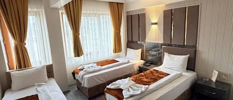 Standard Triple Room, 3 Twin Beds | Premium bedding, minibar, soundproofing, free WiFi